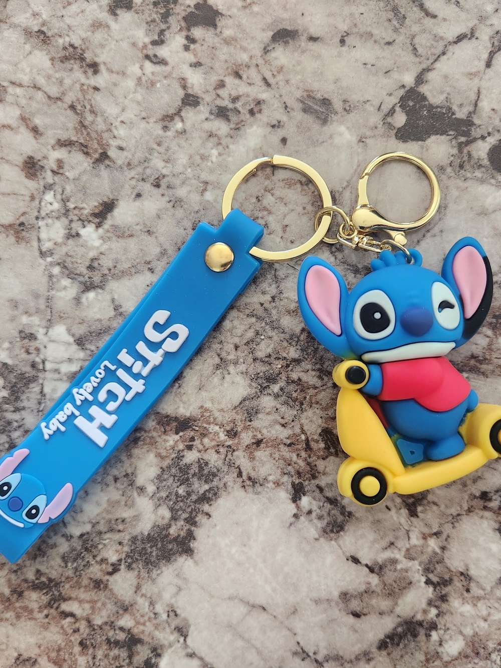 Stitch Riding Yellow Scooter Keychain with Blue Strap